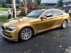 Gold BMW full vehicle wrap